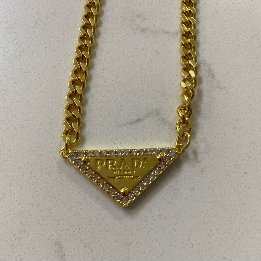 GOLD Prada necklace